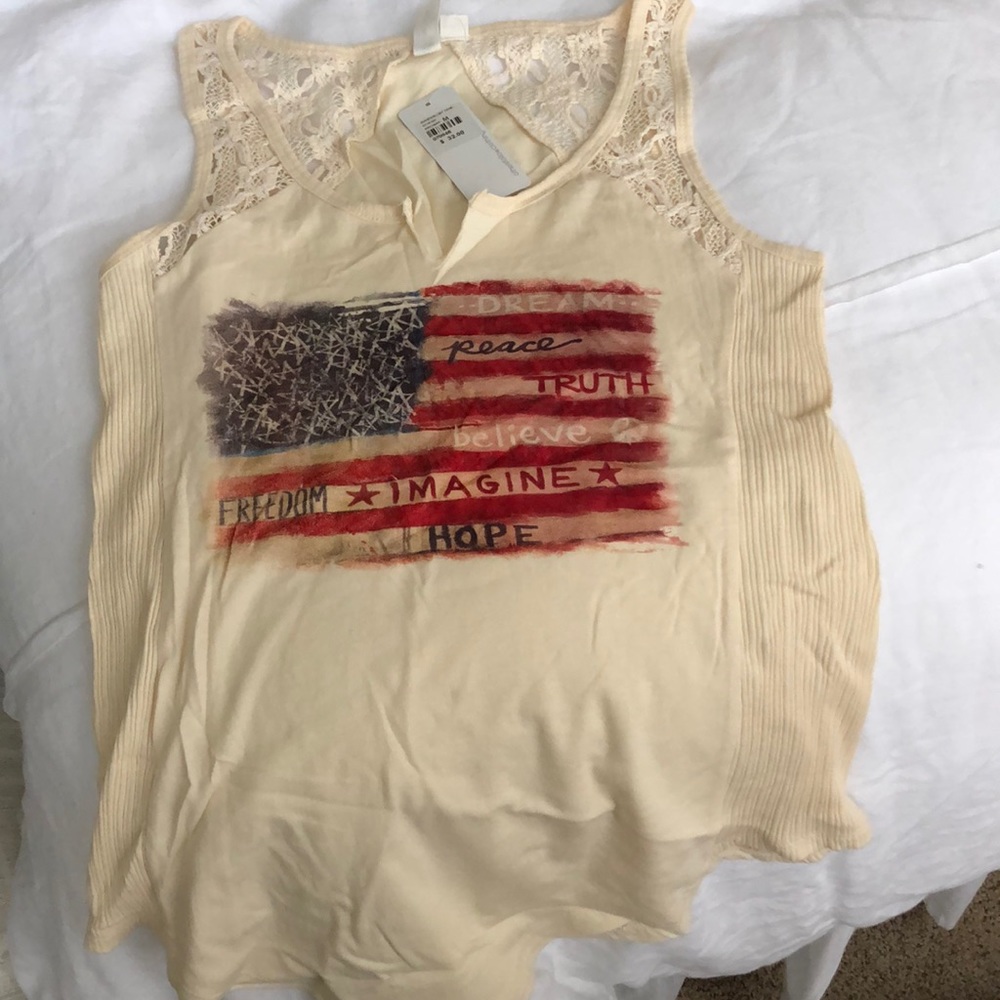 Brand new others follow tank with American flag